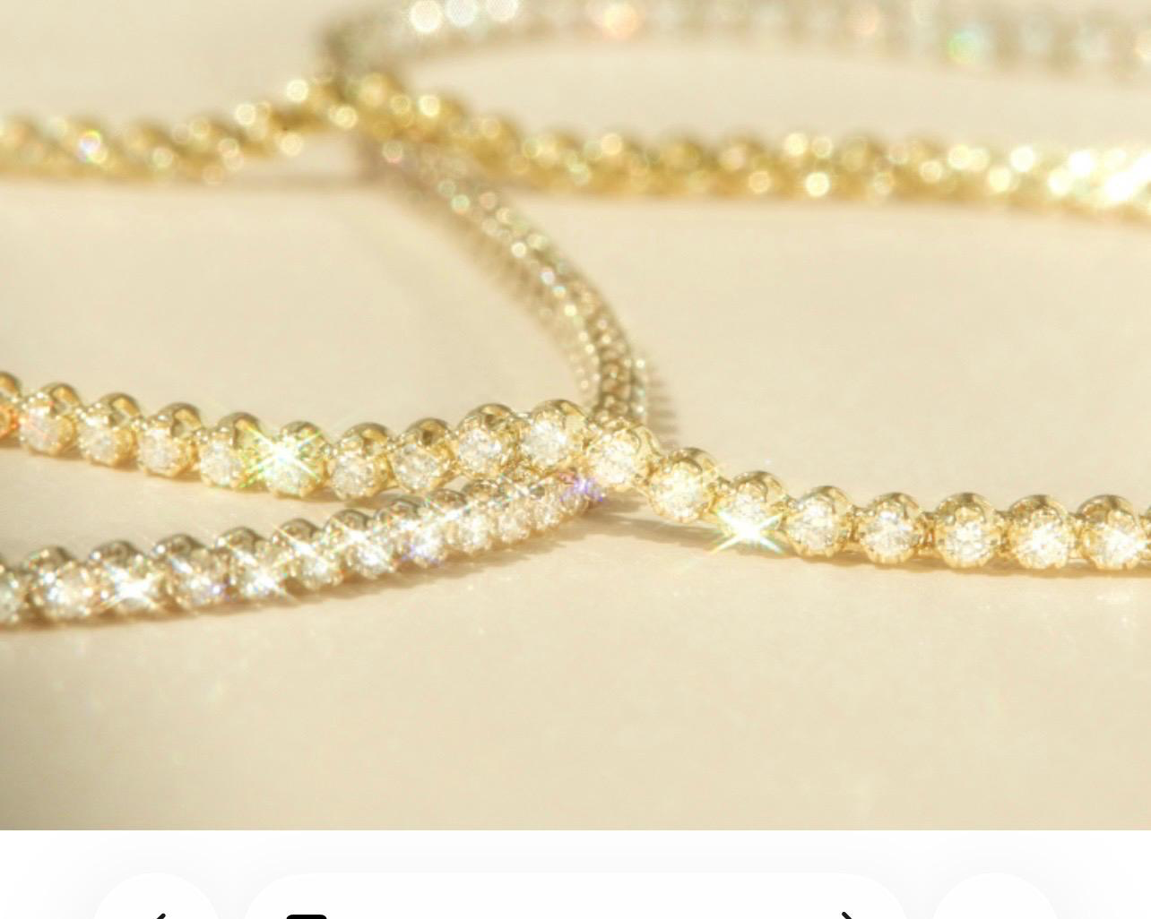 Layered diamond tennis bracelets in gold and silver at Ramoutar Jewellers